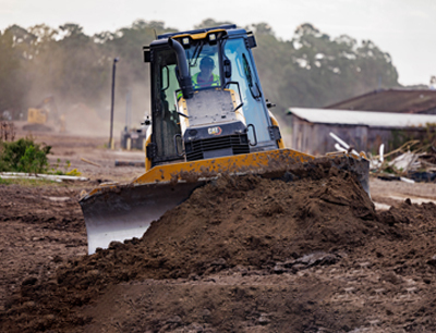 Backhoe at sunset